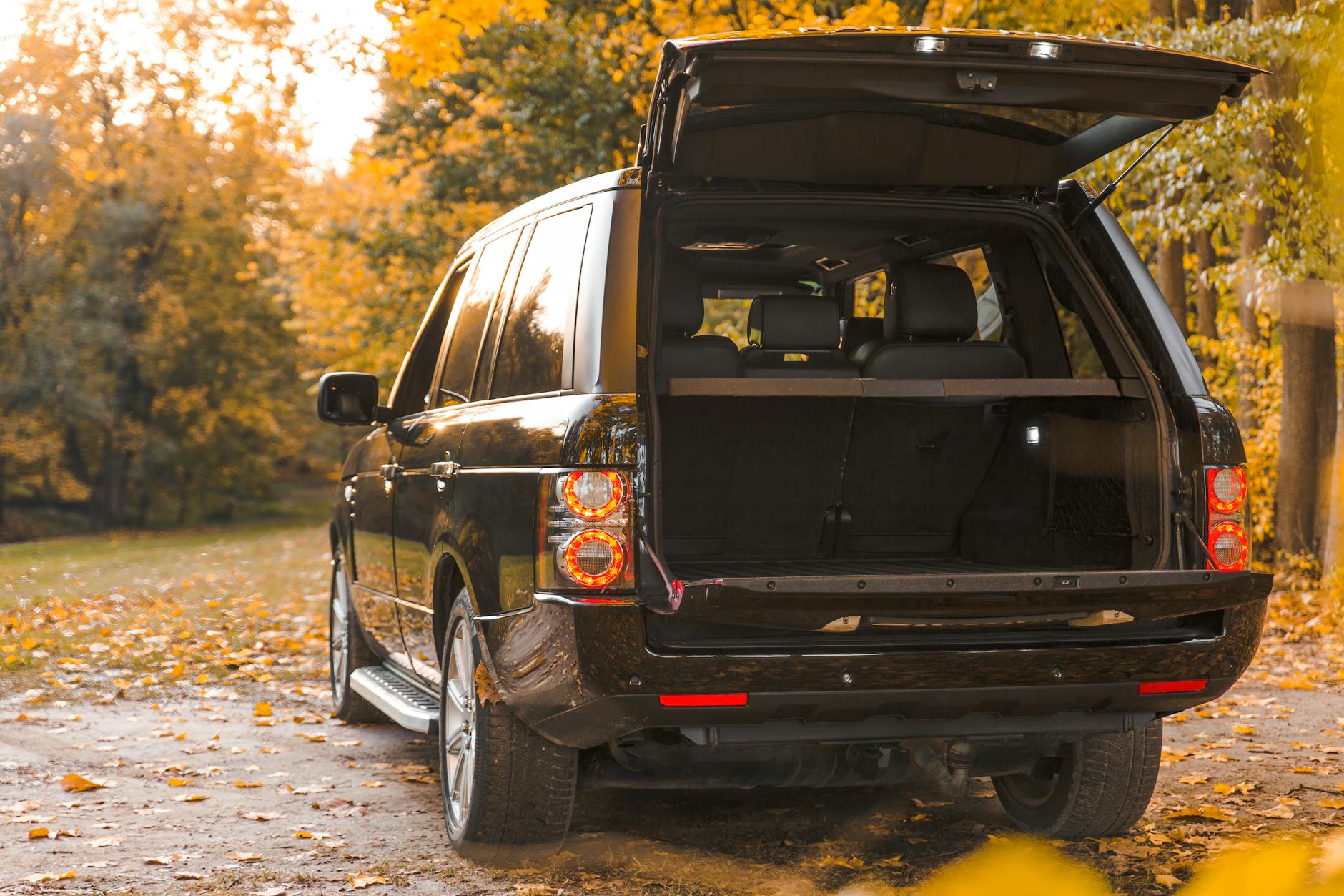black car parked on off road